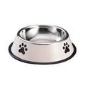 White stainless steel dog bowl with black paw prints and non-slip rubber base